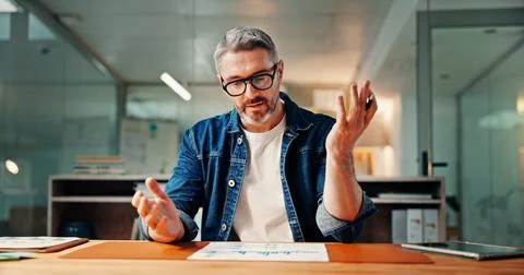 Documents, problem solving and reading with business man at desk in office .. Foto stock
