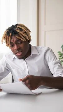 Documents problems business fail worried man check Stock Photos