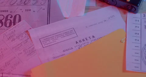 Documents scattered table inscription questionnaire seal secret camera Stock Footage 186235296