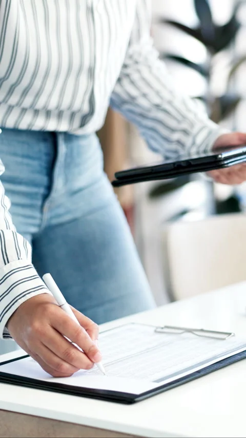 Documents, tablet and hands of woman in store for online order, ecommerce or Stock Footage 336746319