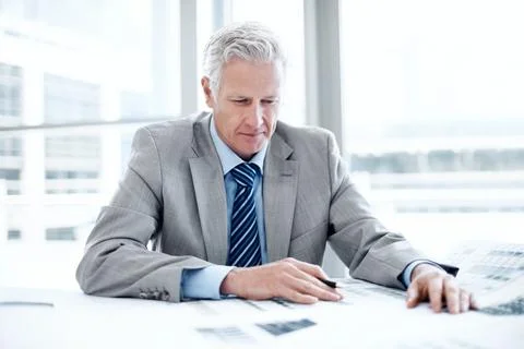 Documents, thinking and businessman in office with planning for finance rep.. Stock Photos