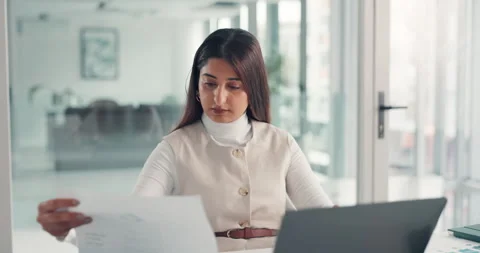 Documents, typing and laptop with business woman for reading, insurance fraud Stock Footage 335939789
