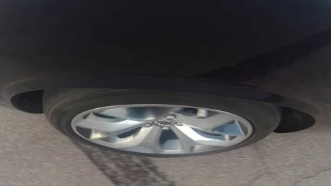 A Dodge Challenger speeding and burning rubber in a parking lot 2. Stock-Footage 116484503