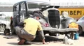 Dodge DR Special, 1934, Floating power, repair man under vehicle HD Footage