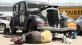 Dodge DR Special, 1934, repair man under vehicle changing oil HD Footage