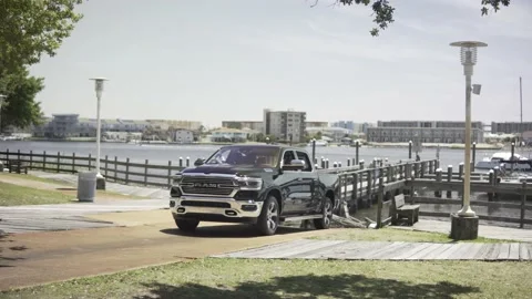 Dodge Ram pulling away from a boat launch Stock Footage 154008992