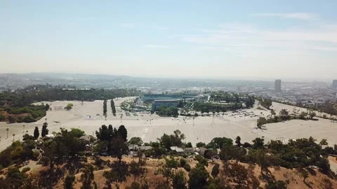 Dodger Stadium in Los Angeles with empty parking area at sunny day. Stock Footage 281676916
