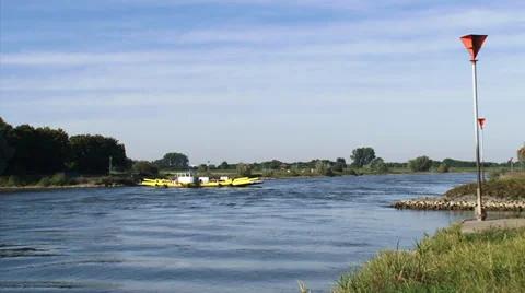 Doesburg - Bronkhorst cable ferry across IJssel river, The Netherlands Stock Footage 33497503