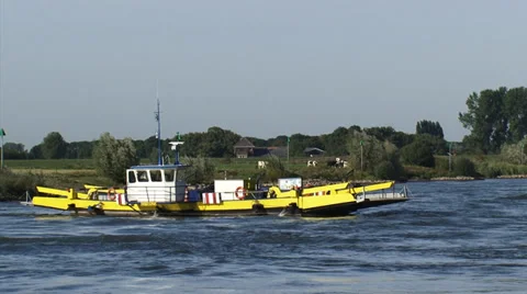 Doesburg - Bronkhorst cable ferry across the Dutch river IJssel - close up Stock Footage 33497816