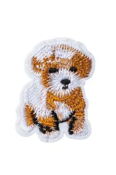 Dog embroidered patch isolated on white background Fotos de archivo
