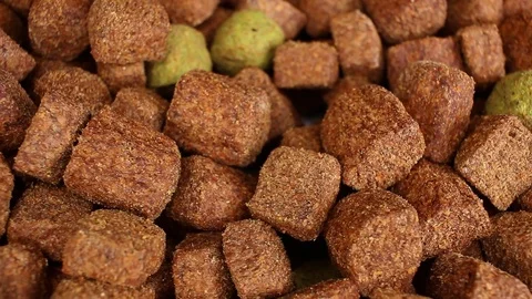 Dog food closeup texture pattern seamless looping rotating video footage hd Video stock 102679765