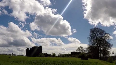 Dog running to the Kendal Castle Stock Footage 77865245