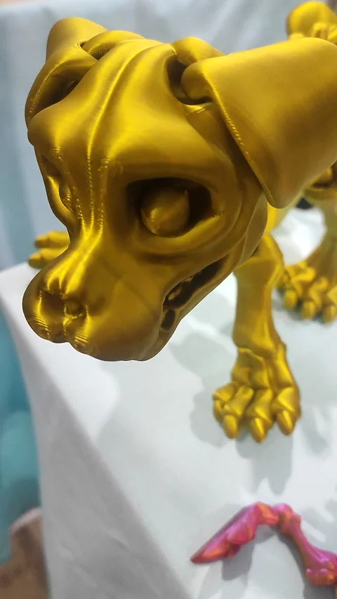 Dog skeleton head printed 3D printer molten plastic close-up. Creative Vertical Stock Footage 303953335