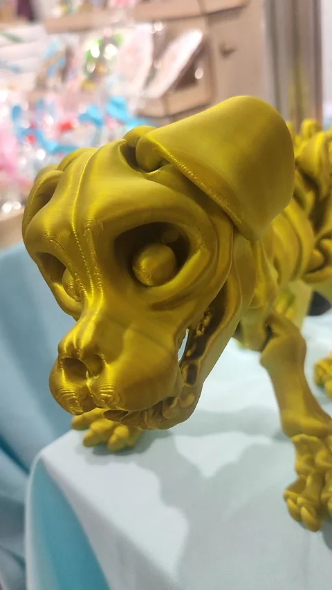 Dog skeleton head printed 3D printer molten plastic close-up. Creative Vertical Stock Footage 303953399