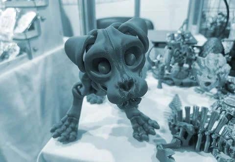 Dog skeleton head printed on a 3D printer from molten plastic close-up. Stock Photos