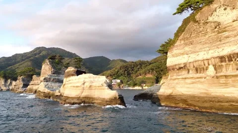 Dogashima Sunset Cliff Sideways Tracking Drone Shot 4K Stock Footage 326081874