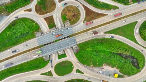 A dogbone interchange, seen from above by a drone. Video stock 249728792