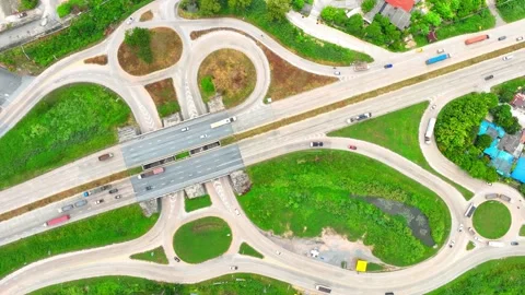 A dogbone interchange, seen from above with a drone. Video stock 249729014