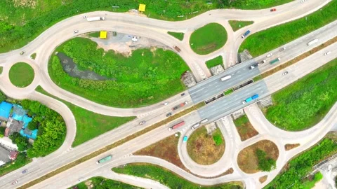 A dogbone interchange, seen from above by a drone. Stock Footage 249729018