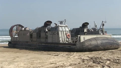 DOGU BEACH, MARCH 2016, US hovercraft stand on beach. Stock Footage 72862999