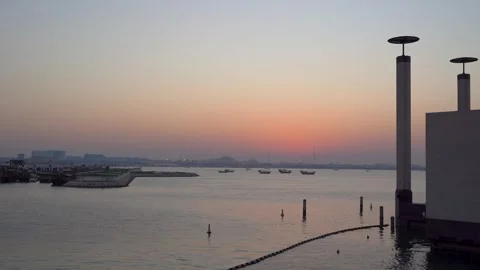 Doha Harbor at Sunset with Dhow Boats and MIA, Qatar Stock Footage 337771033