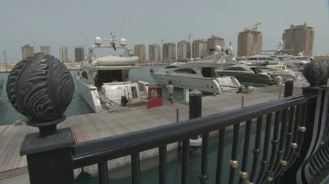 DOHA - THE PEARL - TILT DOWN Stock Footage 8537094
