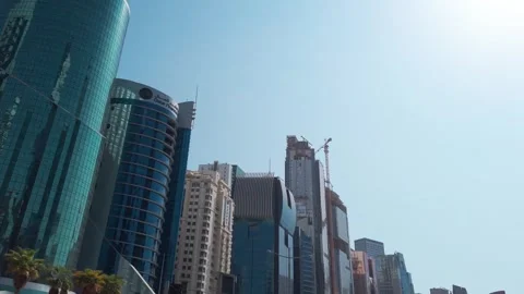 Doha, Qatar - 24 Oct. 2025: Driving through city downtown at financial centre Stock Footage 325561172