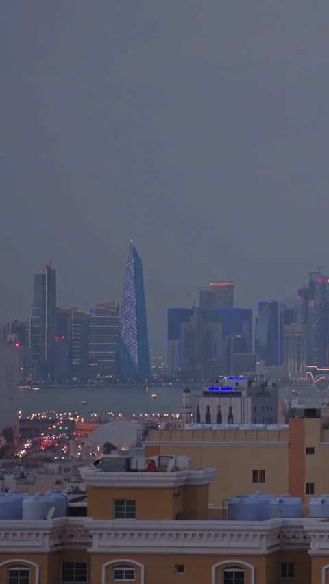 Doha, Qatar - 7th january, 2026: cinematic timelapse West Bay skyscrapers l.. Stock Footage 331188694
