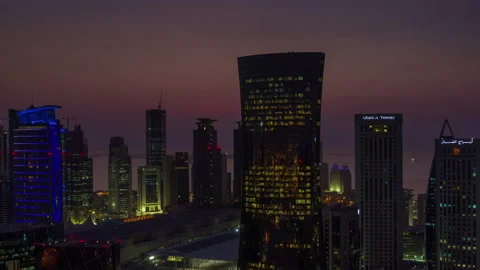 DOHA, QATAR - APRIL, 2023: Timelapse hyperlapse video of Doha downtown at night Stock Footage 238975366