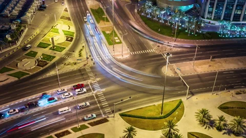 DOHA, QATAR - APRIL, 2023: view down timelapse video crossroad intersection Stock Footage 241929054
