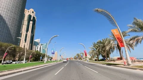 Doha, Qatar: Driving car on road surrounded by modern buildings (skyscrapers) Video stock 180941391