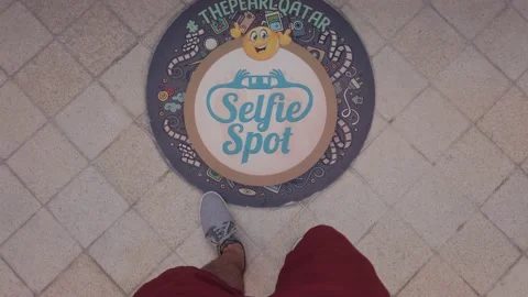 Doha, Qatar - Jun 20,2022: Tourist pov walking on selfie photography spot in  Stock Footage 199703517