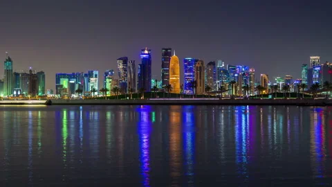 DOHA, QATAR - JUNE 30th 2017: skycreapers tall buildings timelapse night Stock Footage 238977641