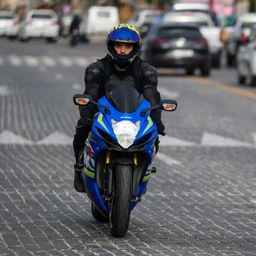 Doha - Qatar - March 19, 2024: A motorcycle driver riding a sports bike Foto stock