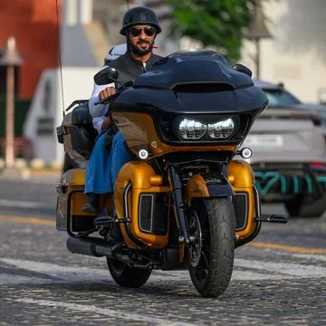 Doha - Qatar - March 19, 2024: A motorcycle driver riding a sports bike Stock Photos