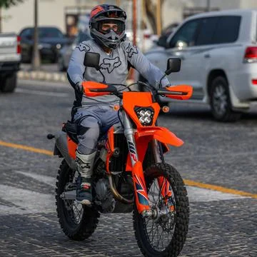 Doha - Qatar - March 19, 2024: A motorcycle driver riding a sports bike Foto stock