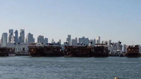 Doha, Qatar - May 10, 2024 - dhow boats with Doha skyline in the background Stock Footage 295050598