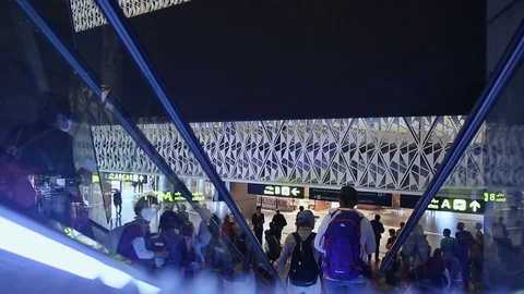 DOHA, QATAR, - OCTOBER 13, 2016: People on escalator at the airport 1 Stock Footage 69865280