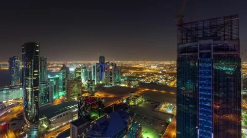 DOHA , QATAR - OCTOBER 25, 2024: Aerial view of illuminated city skyline Stock Footage 289831291