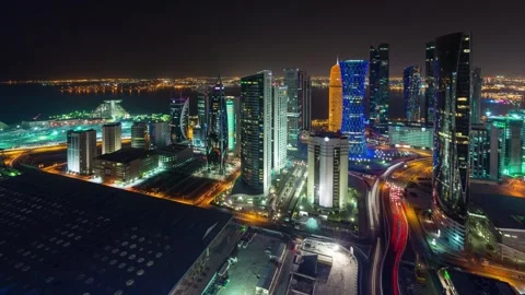 DOHA, QATAR - OCTOBER 25, 2024: Nighttime view of the vibrant skyline showcasing Stock Footage 289831349