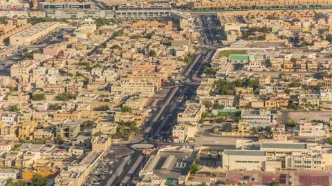 DOHA, QATAR - OCTOBER 25, 2024: Aerial view showcasing urban life, roads, and Stock Footage 289834455