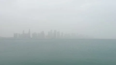 Doha skyline on a misty wet day in the desert, Qatar Stock Footage 169747754