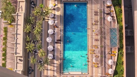 Doha swimming pool timelapse sunny day skycreapers downtown hotel Qatar, Middle Stock Footage 85378293