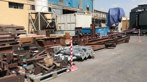 Doha,Qatar-02/10/2022:Structural steel accumulated in mechanical junk yard Stockbeeldmateriaal 170368341