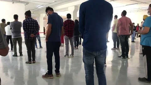 Doha,qatar-02/17/2022:People or public in Queue or in big line for vaccination Stock Footage 170480069