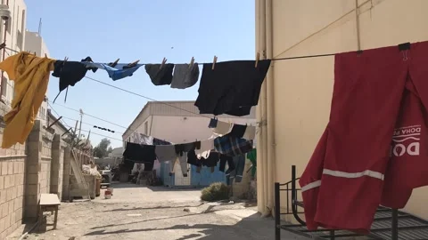 Doha,Qatar-02/19/2022: Time lapse of drying clothes in direct sun and wind Stockbeeldmateriaal 170608939