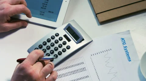 Doing accounts, overhead view Stock Footage 61816862