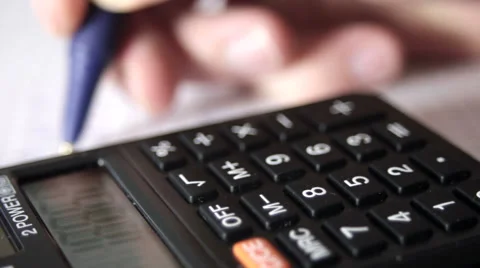 Doing Calculations Stock Footage 63440286
