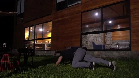 Doing dances and pranks on the floor as punishment for a game between friends at Video stock 199628210