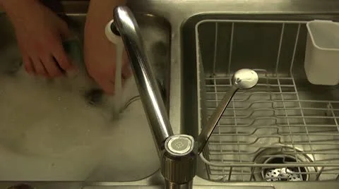 Doing Dishes Time Lapse Stockbeeldmateriaal 10585048